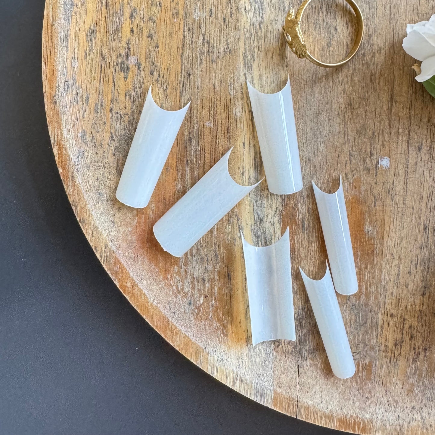 Pre-Etched Square Half Cover Nail Tips in a tray