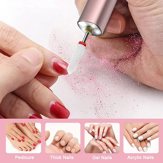 Cordless nail drill in action, gently polishing fingernails during at-home manicure.