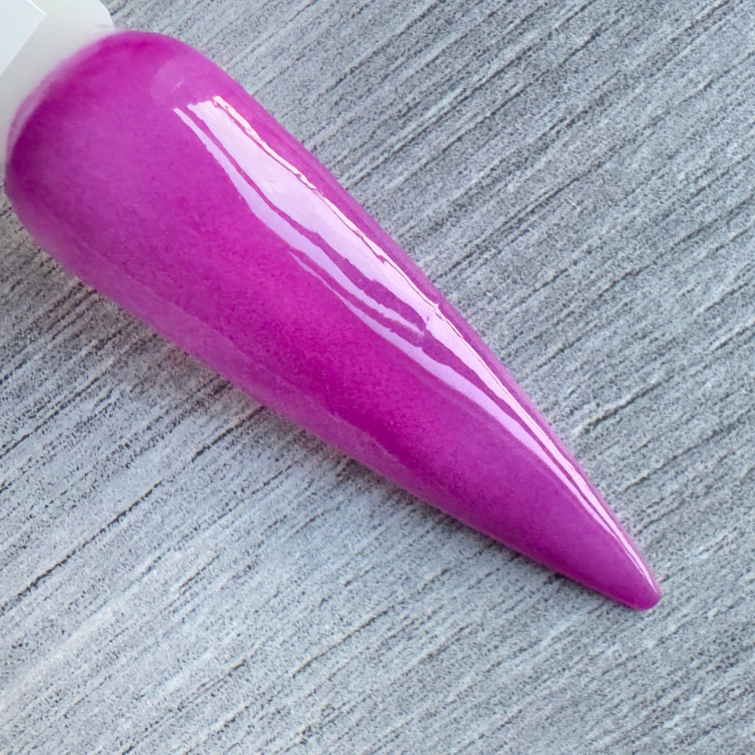 Purple dip powder nails in lilac and plum shades