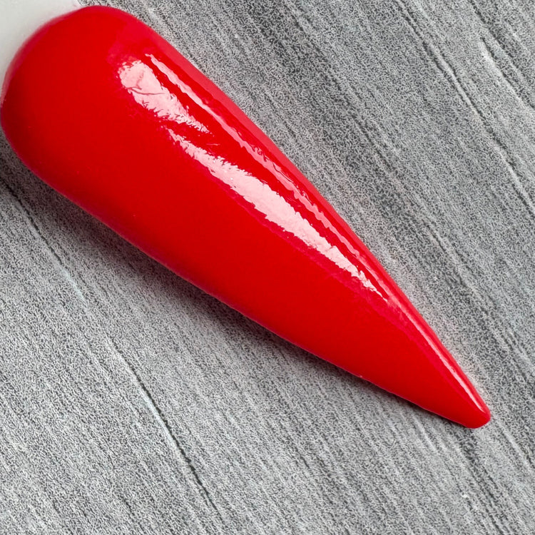 Red dip powder nails in classic and deep red tones