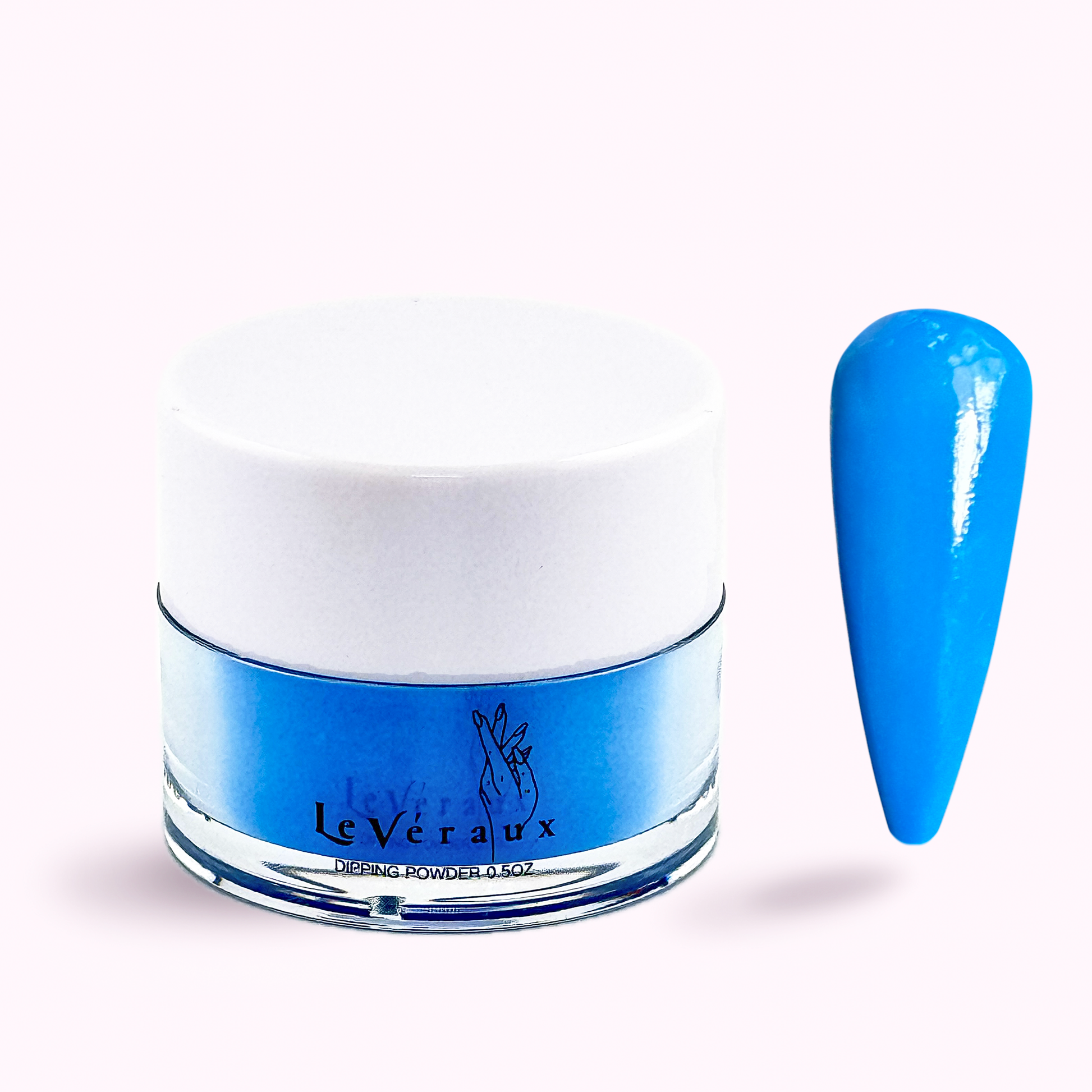 Blue dip powder in a jar with a matching blue nail tip on a white background