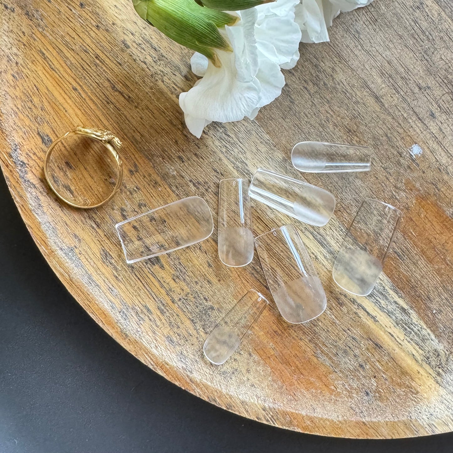 clear soft gel nail tips showing pre-etched surface for better adhesion