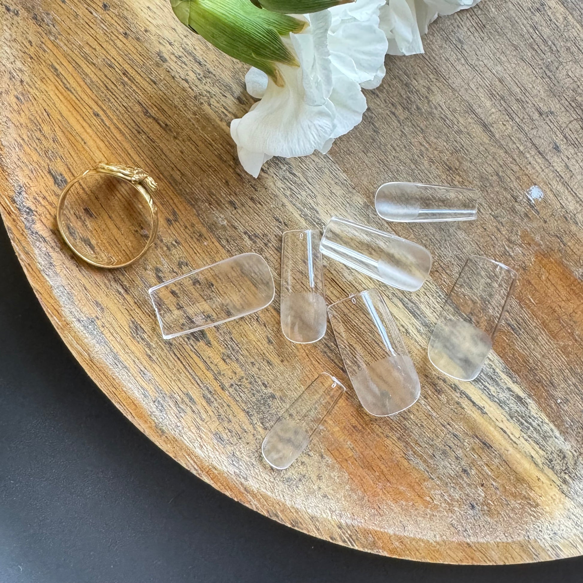 clear soft gel nail tips showing pre-etched surface for better adhesion