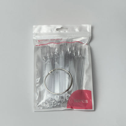 Close-up of nail swatch sticks fanned out, each showing different nail polish or dip powder shades for easy colour selection